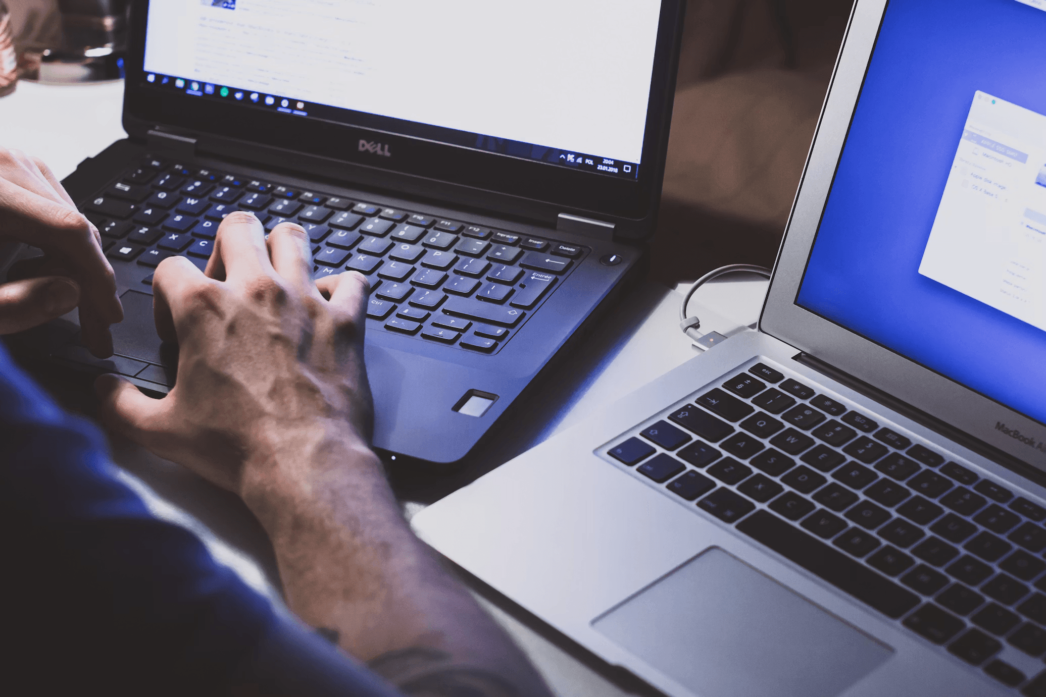 Images of people working on computers in an office setting