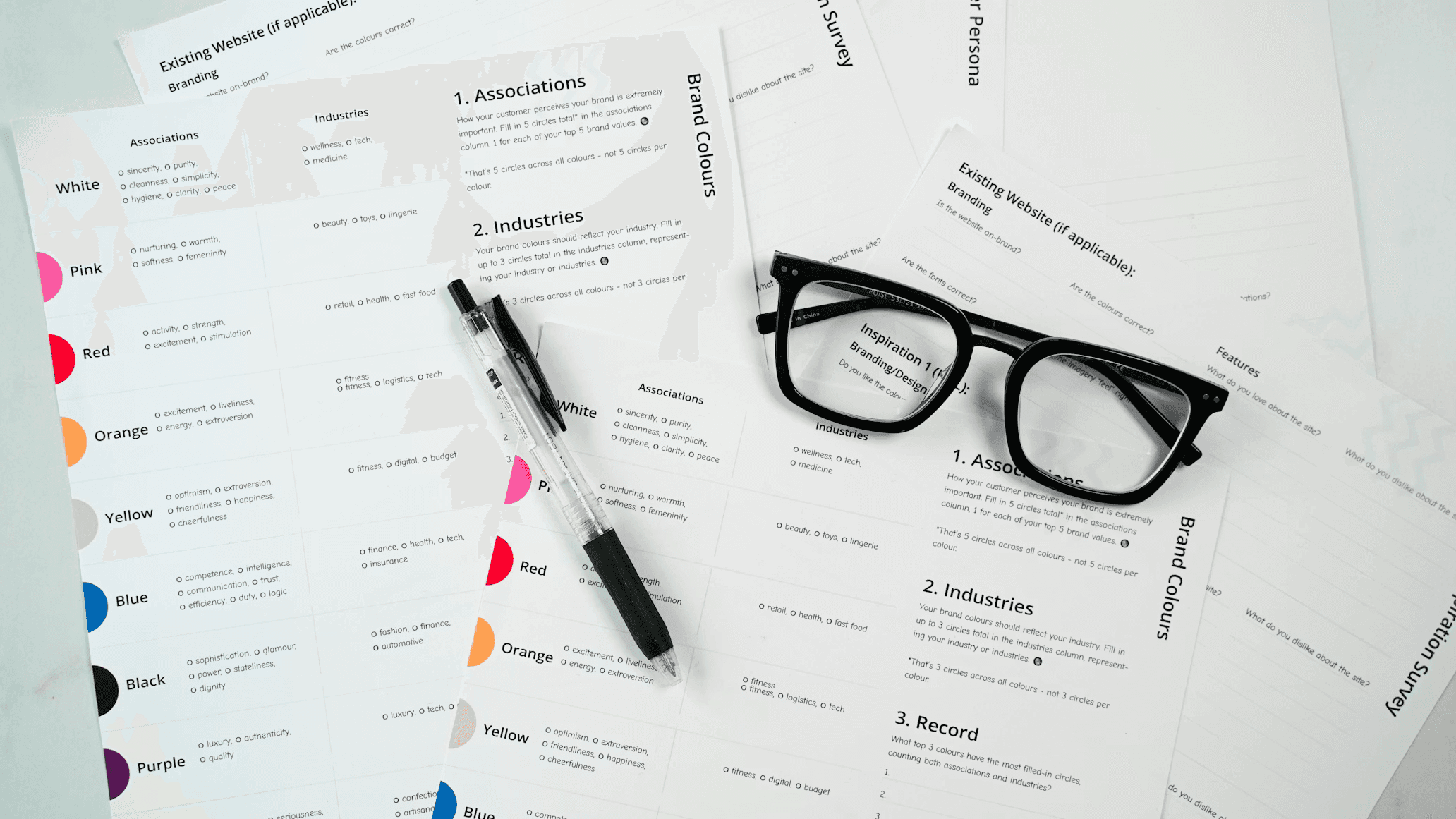 Images of paperwork on a desk in a professional office setting