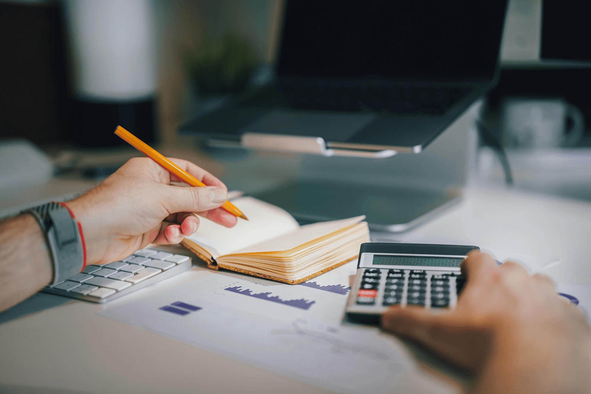 Images of paperwork on a desk in a professional office setting