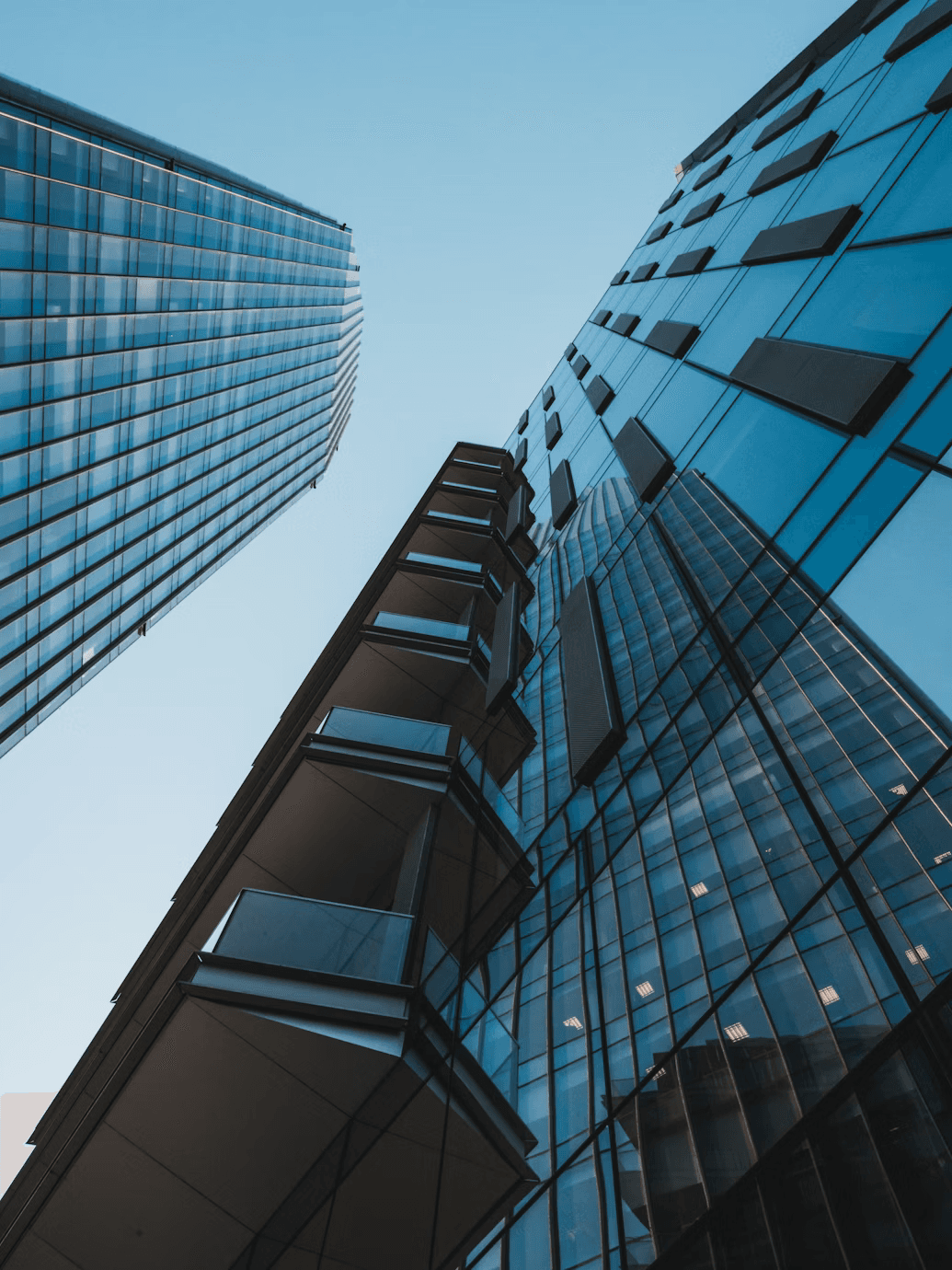 Real estate listings. Homes, buildings and an office building